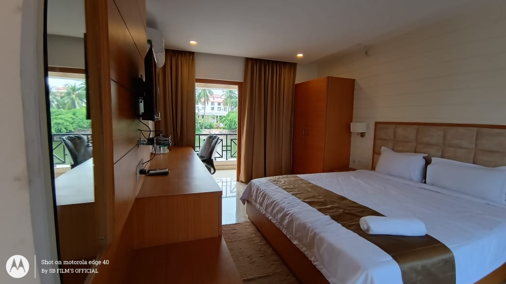 Room with balcony and resort view